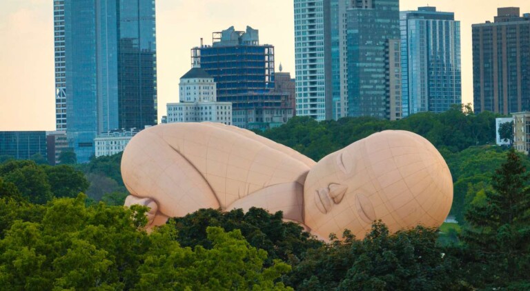Crowds Awed by Floating Baby in Colossal Art Installation Over Lake Michigan